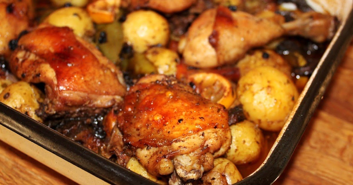 Frango assado com batatas e legumes